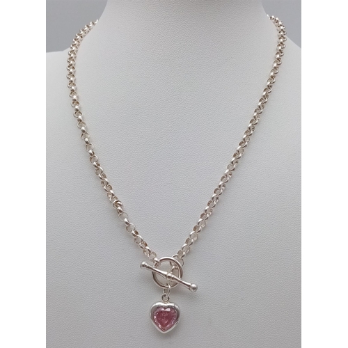 897 - A 925 Silver, T-Bar Belcher Link Necklace with a pink heart stone pendant. 
Weight: 12.49g