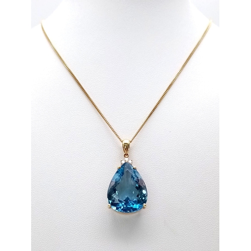 95 - A Captivating 29ct Brazilian Blue Topaz, Diamond and 18K Gold Pendant - On an 18K Yellow Gold Neckla... 