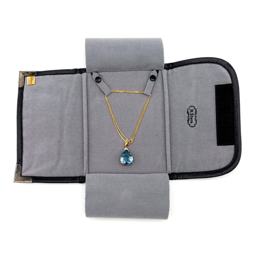 95 - A Captivating 29ct Brazilian Blue Topaz, Diamond and 18K Gold Pendant - On an 18K Yellow Gold Neckla... 