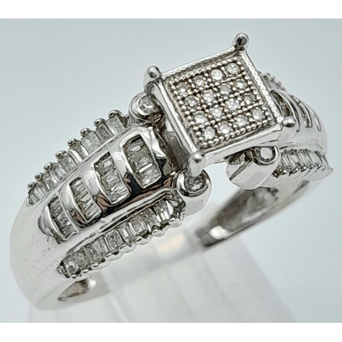 1386 - A 10K WHITE GOLD DIAMOND RING, WITH ROUND, BAGUETTE AND SQUARE CUT DIAMOND PAVE DECORATION 0.40CT 3.... 