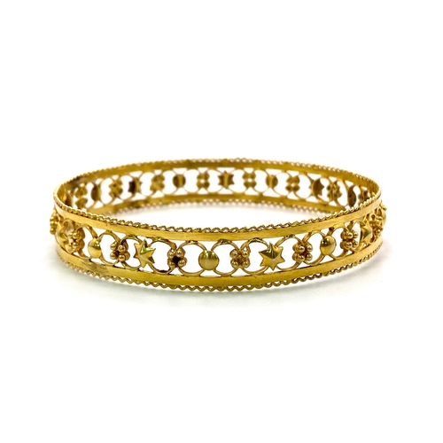 1252 - A vintage, early 1960s, 14 K yellow gold bangle, internal diameter: 66 mm, weight: 17.2 g.