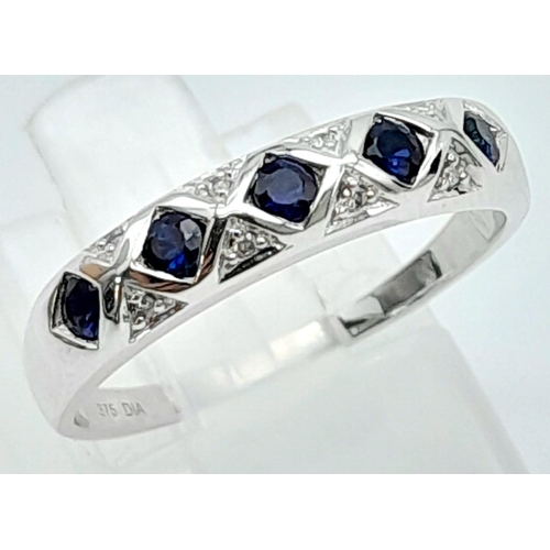 1347 - A 9K WHITE GOLD DIAMOND & SAPPHIRE BAND RING. 2.2G SIZE M.