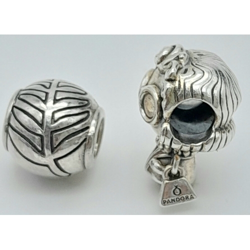 1354 - 2 X PANDORA CHARMS - GIRL CHARM HOLDING PANDORA BAG & FEATHER BALL CHARM. Total weight: 9.4G 
ref: S... 