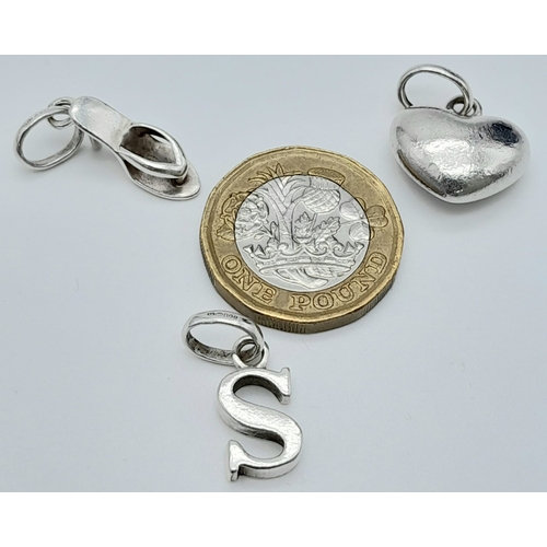 1407 - 3 X GENUINE LINKS OF LONDON STERLING SILVER CHARMS HEEL, HEART & INITIAL S. Total weight:  7.5G
ref:... 