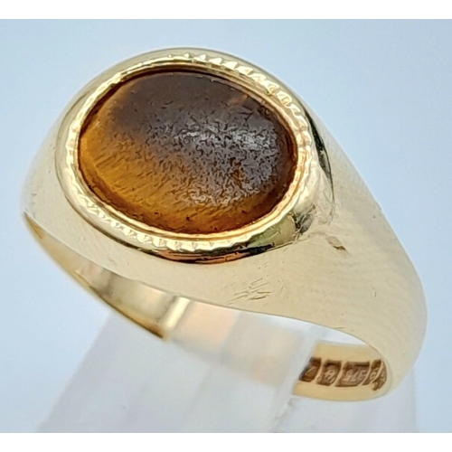 1294 - A 9K YELLOW GOLD TIGERS EYE SET OVAL SIGNET RING 3G SIZE P
ref: A/S 4001