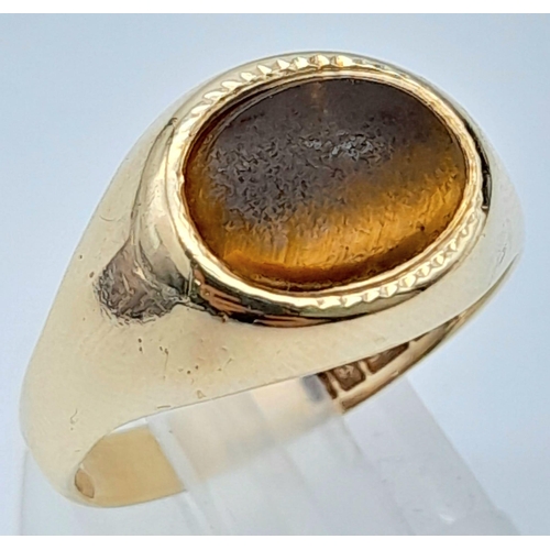 1294 - A 9K YELLOW GOLD TIGERS EYE SET OVAL SIGNET RING 3G SIZE P
ref: A/S 4001