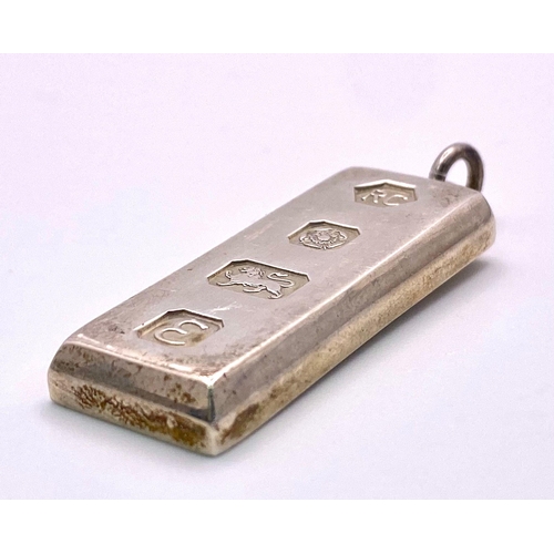 1315 - A STERLING SILVER FULLY HALLMARKED INGOT. TOAL WEIGHT 31.3G.