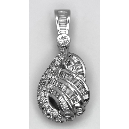 1495 - AN 18K WHITE GOLD DIAMOND SET PENDANT - 1CT APPROX MIXTURE OF BAGUETTES, TAPERRED BAGUETTES AND ROUN... 