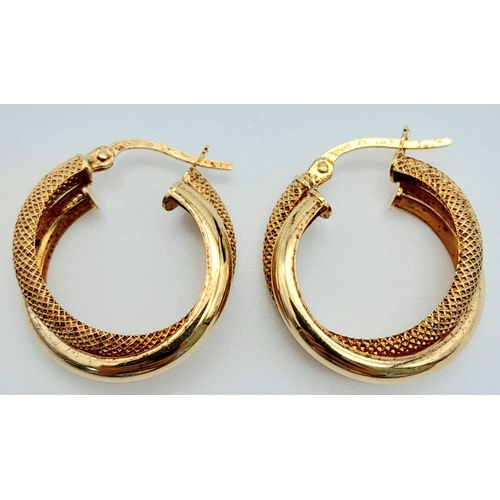 1509 - A 9k yellow gold textured hoop earrings, 1.7g, 2cm wide