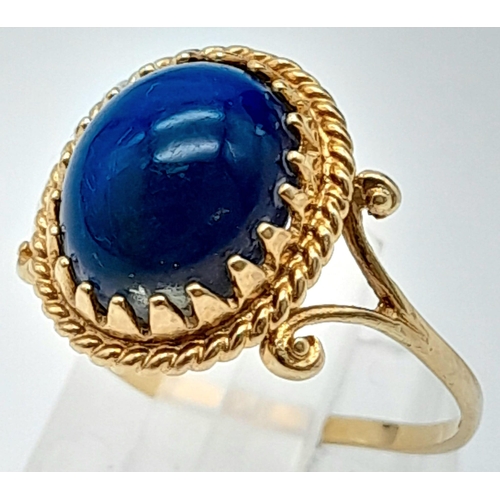 1663 - A 9K YELLOW GOLD BLUE STONE SET RING 1.7G SIZE N