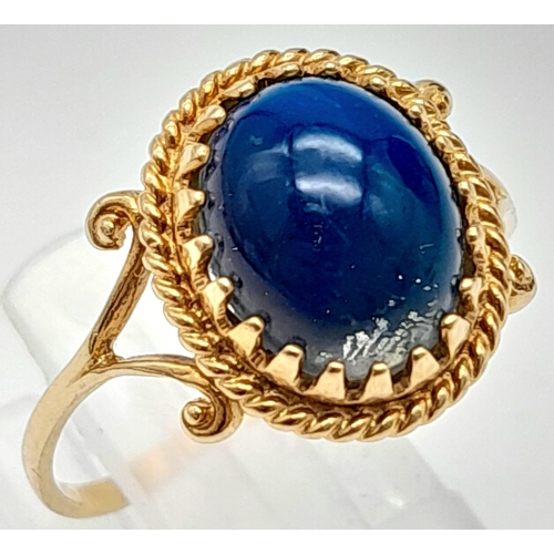 1663 - A 9K YELLOW GOLD BLUE STONE SET RING 1.7G SIZE N