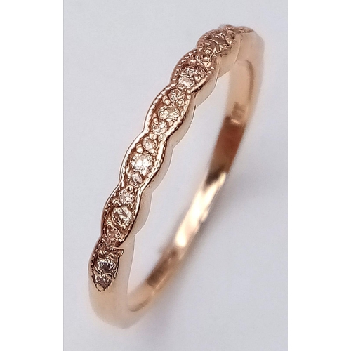 1898 - A 14K ROSE GOLD DIAMOND SET HALF ETERNITY RING 2.1G SIZE N/O