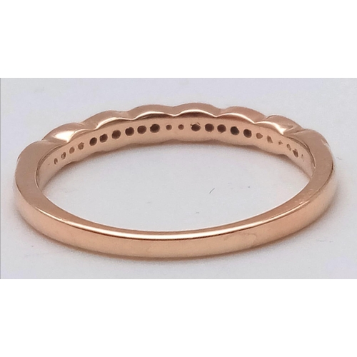 1898 - A 14K ROSE GOLD DIAMOND SET HALF ETERNITY RING 2.1G SIZE N/O