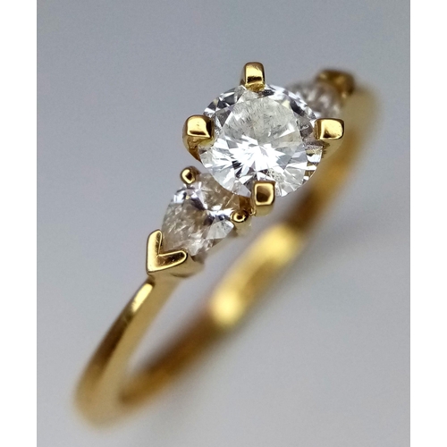 117 - A 18CT YELLOW GOLD DIAMOND 3 STONE RING 0.60CT 2.7G SIZE M/N
ref: P176