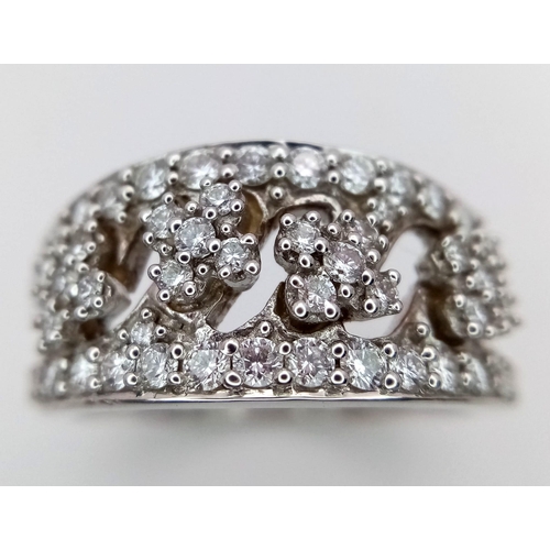 131 - A 18CT WHITE GOLD FANCY WIDE BAND DIAMOND SET RING  5.8G 0.85CT SIZE N/O
ref: P194