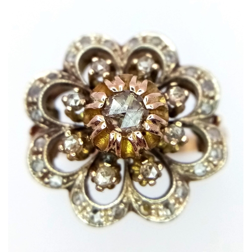 17 - An antique, 14 K yellow gold ring with a fancy cluster of old cut diamonds, ring size: K1/2, weight;... 