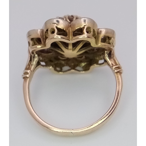 17 - An antique, 14 K yellow gold ring with a fancy cluster of old cut diamonds, ring size: K1/2, weight;... 