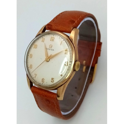 173 - A 9K YELLOW GOLD CASED OMEGA WATCH ON TAN LEATHER STRAP. FULL WORKING ORDER 
ref: MB 5001