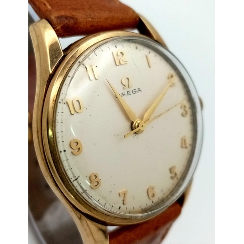 173 - A 9K YELLOW GOLD CASED OMEGA WATCH ON TAN LEATHER STRAP. FULL WORKING ORDER 
ref: MB 5001