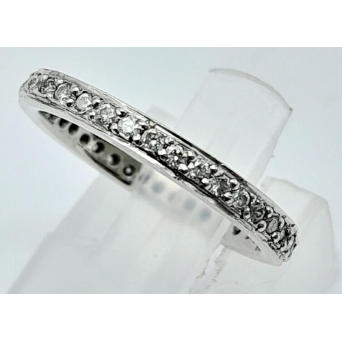 201 - PLATINUM DIAMOND SET FULL ETERNITY RING, 0.60CT.
WEIGHT: 3.4G 
SIZE: J 1/2 

SC 5001