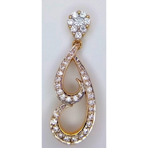 212 - An 18K Yellow Gold Diamond Set Fancy Drop Pendant. 3cm length, 0.40ctw, approximately 3.6g total wei... 