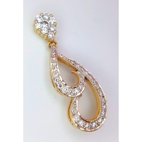 212 - An 18K Yellow Gold Diamond Set Fancy Drop Pendant. 3cm length, 0.40ctw, approximately 3.6g total wei... 