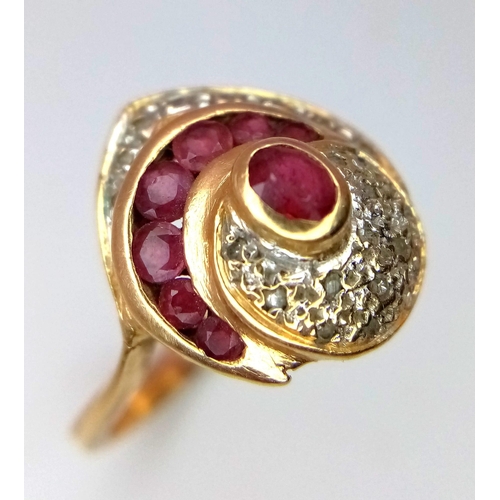 215 - 14K YELLOW GOLD DIAMOND & RUBY FANCY RING.
WEIGHT: 3.7G 
SIZE L

SC 5019