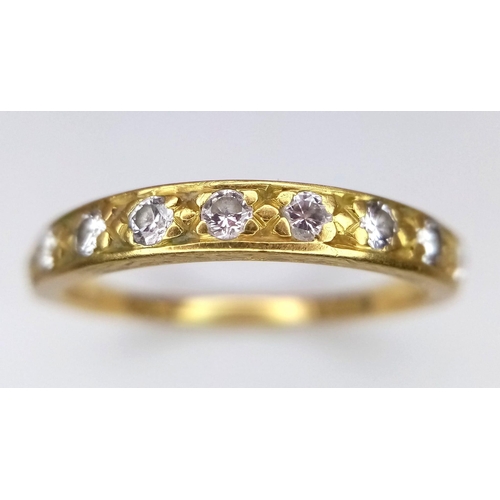 240 - An 18K Yellow Gold Diamond Set Band Ring. Size P, 0.20ctw, 2.2g total weight.