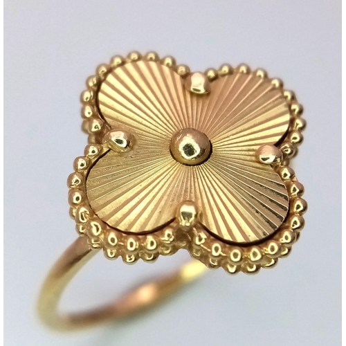 289 - An 18 K yellow gold four leaf clover ring in in VCA style. Size:  M, weight: 3.6 g.