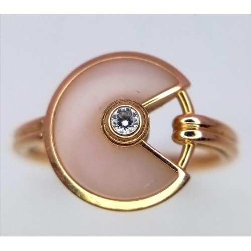 29 - An 18 K rose gold CARTIER ring with a rose quartz and diamond pendant style top. Size: M, weight: 3.... 