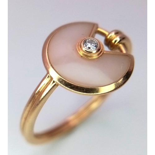 29 - An 18 K rose gold CARTIER ring with a rose quartz and diamond pendant style top. Size: M, weight: 3.... 