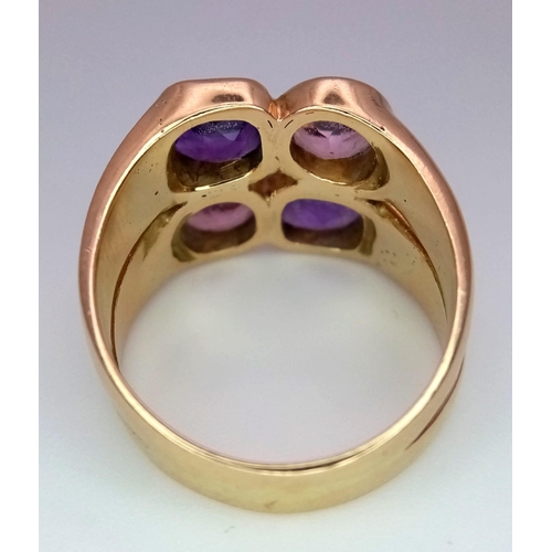 31 - A 14 K rose gold ring with four amethysts. ring size; P, weight: 10 g.