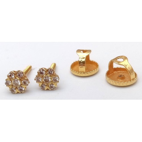 320 - A 18K YELLOW GOLD DIAMOND STUD EARRINGS 0.10CT WITH SCREW BACK FITTINGS 1.4G
ref: AS 5003