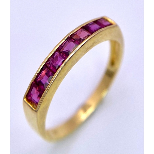 385 - A 14 K yellow gold half eternity ruby ring. Size: O, weight: 2g.