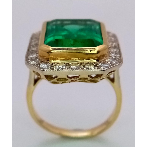 43 - AN EXQUISITE 7.6ct COLOMBIAN OCTAGONAL CUT EMERALD
SURROUNDED BY A HALO OF FINE QUALITY DIAMONDS IN ... 