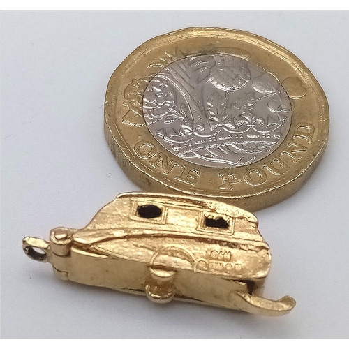 496 - 9K YELLOW GOLD CARAVAN CHARM TRAVELLER.
WEIGHT: 3.3G

SC 5004