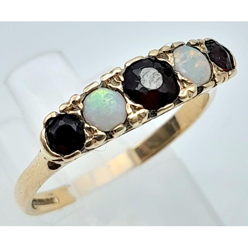 517 - 9K YELLOW GOLD VINTAGE GARNET AND OPAL 5 STONE RING 
WEIGHT: 2.4G 
SIZE P

SC 5010