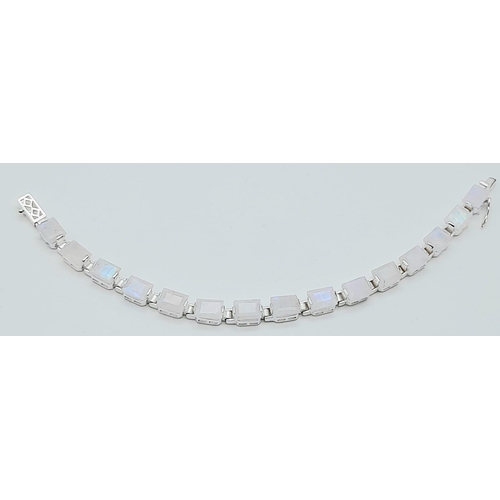 531 - A Rectangular Cut Moonstone Gemstone Tennis Bracelet set in 925 Silver. 19cm. 17.8g total weight. Re... 