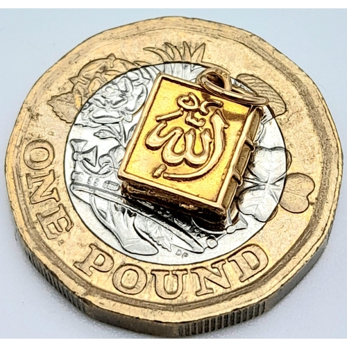 741 - A 18K YELLOW GOLD QURAN CHARM 0.6G 14mm x8mm
ref: SC 5052