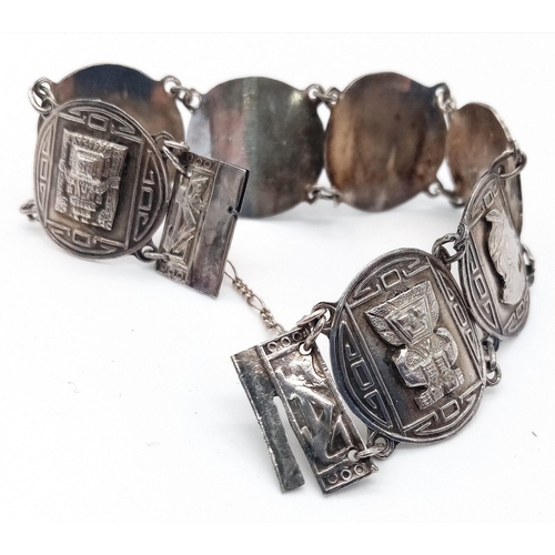 755 - A SILVER AZTEC STYLE BRACELET 26.1G 18.5cm
ref: SC 5063