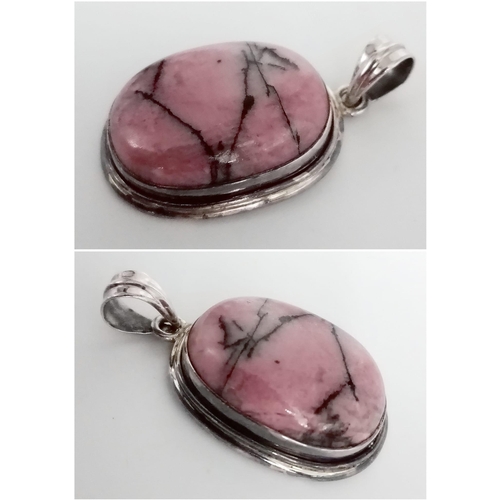 776 - A Sterling Silver Fancy Pink Stone Set Pendant. Approximately 5cm length (including bail), 21.2g tot... 