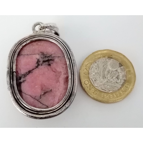 776 - A Sterling Silver Fancy Pink Stone Set Pendant. Approximately 5cm length (including bail), 21.2g tot... 