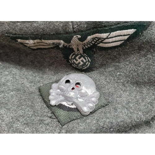 785 - Ersatz (economy issue) Waffen SS M43 Cap. This is a standard Heer (Army) cap that has a panzer colla... 