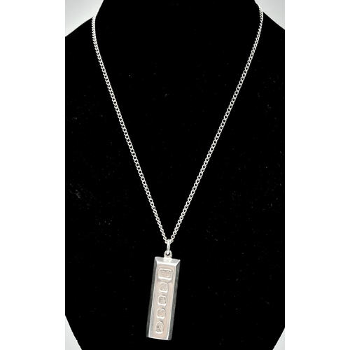 920 - Hallmarked Silver Ingot Pendant on Necklace.
Necklace measures 46cm in length, ingot pendant measure... 