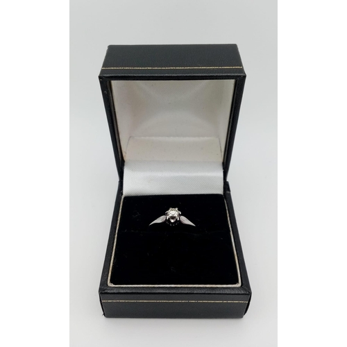 206 - An 18 Carat White Gold Diamond Set Solitaire Ring Size N. Approx .10-.12 Carats. Ring Gross Weight 2... 