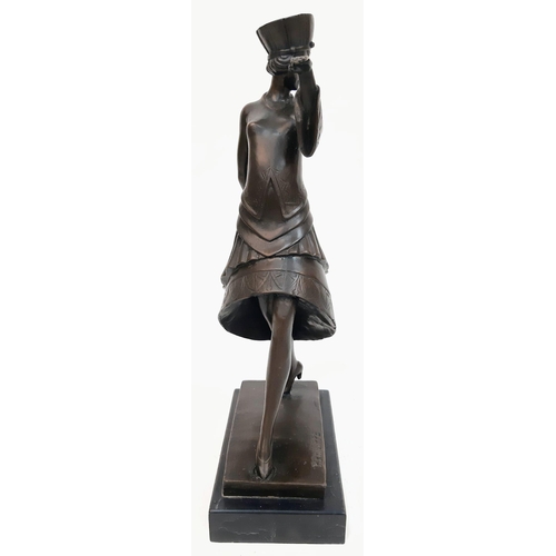 603 - A Bronze figure of an Art Deco Dancer on a rectangular marble base, signed with P.Philippe.
The deta... 