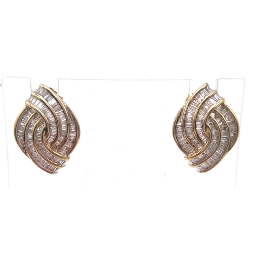 609 - A Pair of 9K Yellow Gold Diamond Swirl Earrings. Baguette diamonds - 2.5ct approx. Boxed. Ref:6942