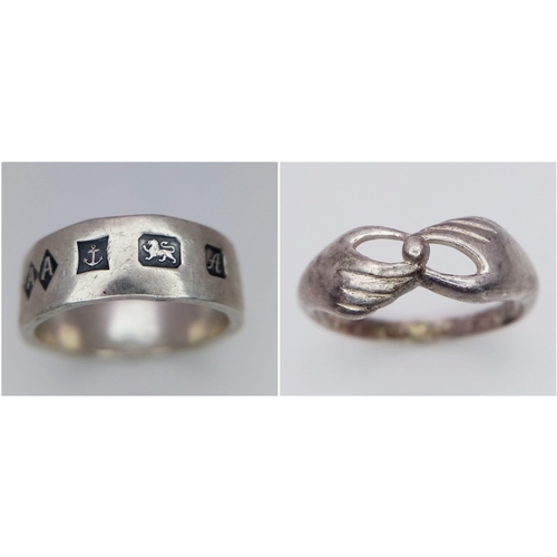 663 - Two Sterling Silver Rings. One band ring with full hallmarks on the front. One hands joining ring, S... 