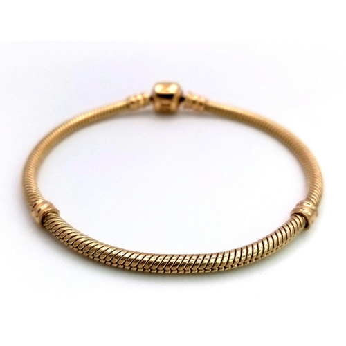 69 - A 14 K yellow gold PANDORA bracelet from the MOMENTS collection. Total weight: 17.1 g. Fashionable a... 