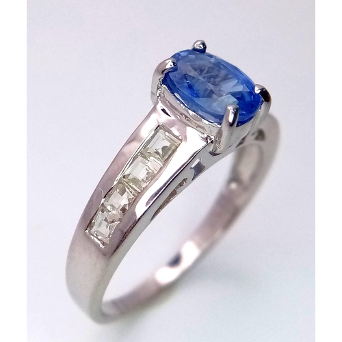 457 - A 9K White Gold Ring set with a 0.95ct Oval Kyanite with White Gemstone Shoulders. Size N. 2.9g tota... 